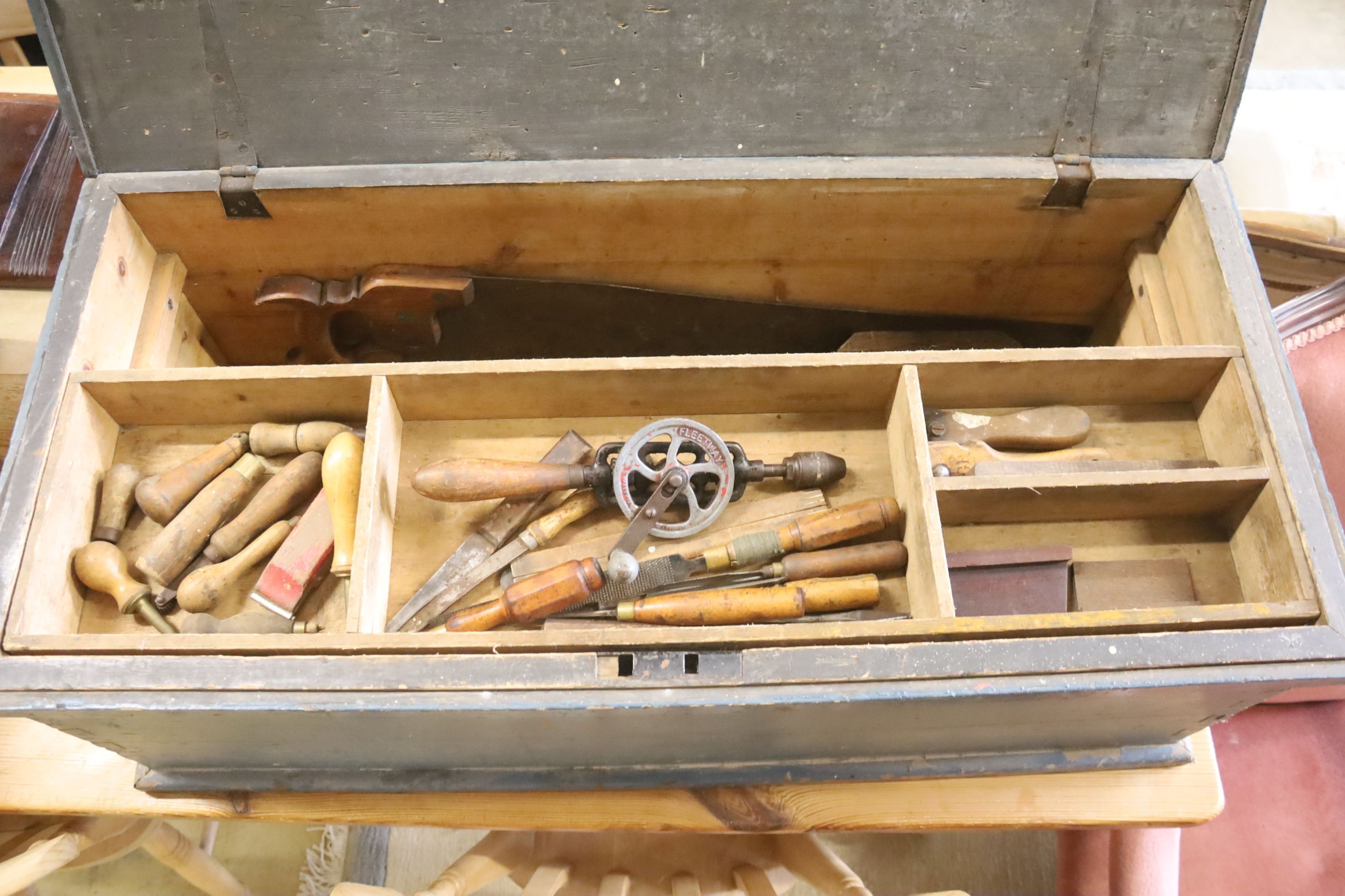 A Victorian pine carpenter's chest, width 92cm, depth 42cm, height 33cm with tools